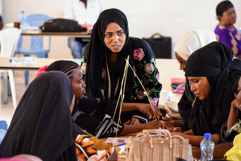 Participants working through a group exercise at a LAMP session